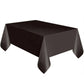 Disposable plastic tablecloth in solid black with draped corners and straight rectangle top.