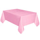 Disposable plastic tablecloth in solid light pink, rectangular with hanging corner drops.