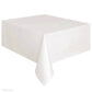 Disposable plastic tablecloth in solid white, rectangular with hanging corner drape.