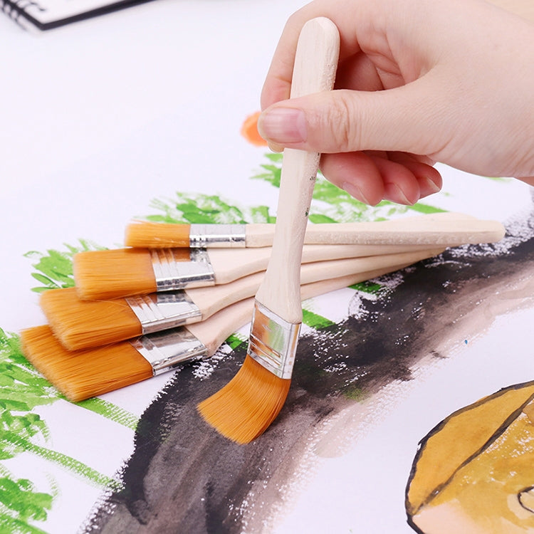 Multiple flat paint brushes with orange nylon bristles for painting