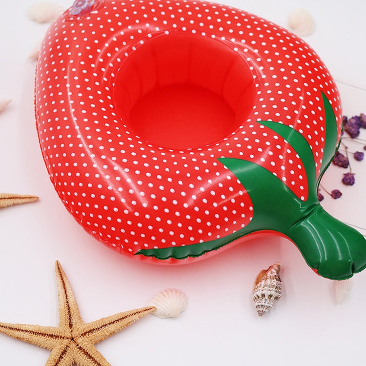 Red polka-dot inflatable strawberry cup holder with green leaves, open center