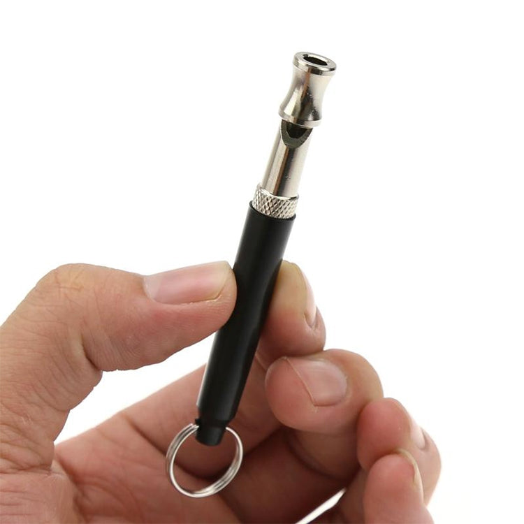 Handheld ultrasonic dog training device with black body, silver tip, and key ring
