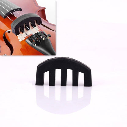 Black silicone violin mute clip with an arched top