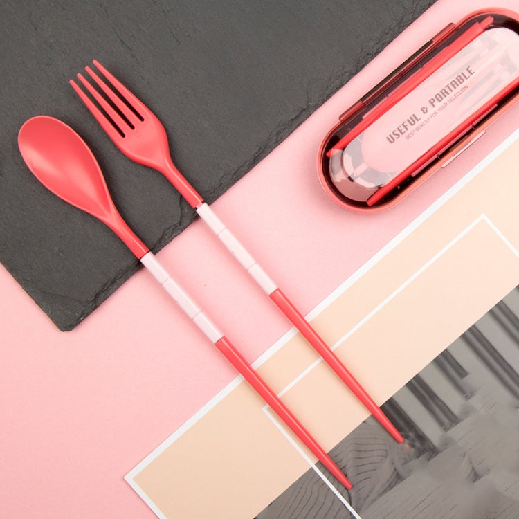 Pink 3-piece dinner cutlery set with utensil case and fork, spoon, knife pieces.