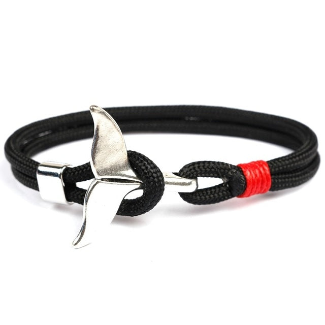 Black rope bracelet with red accent and silver whale-tail anchor charm clasp
