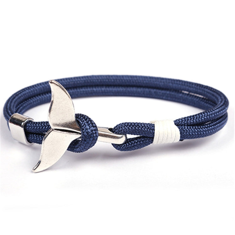 Nautical rope bracelet with whale-tail anchor charm, navy blue braided cord with white section