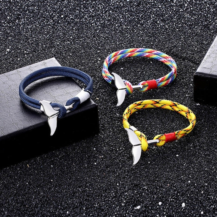 Three rope whale-tail anchor charm bracelets: blue, rainbow, and yellow with silver charms