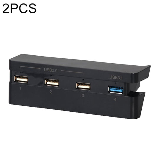 Black USB hub adapter with four USB ports, labeled USB2.0 and USB3.1