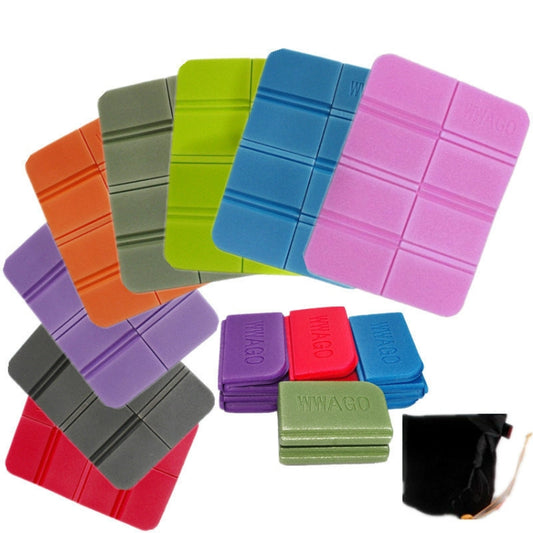 Assorted folding camping mats in multiple colors with black storage pouch