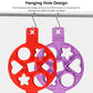 Red and purple silicone egg ring molds with hanging hooks and multiple shapes