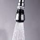 Water filter tap adapter dispensing a fine spray, chrome and black faucet attachment.