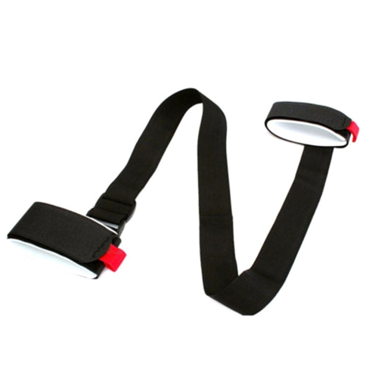 Black nylon fixed strap with gray pad and red end tab, side view