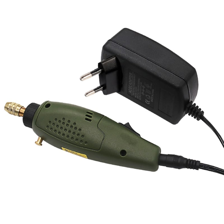 Green electric mini drill tool with attached power adapter cable