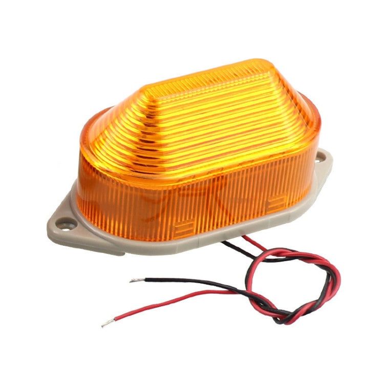 Amber LED mini strobe warning light with gray base and red/black wire leads