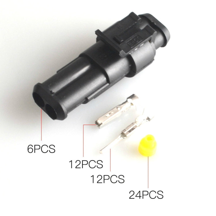Black waterproof cable connector with silver crimp pins and yellow cap seal