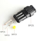 Black waterproof cable connector with silver terminals and yellow cap seal, side view
