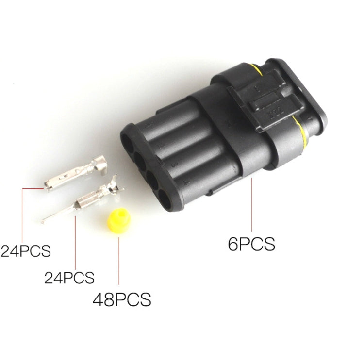 Black waterproof cable connector with yellow seals and silver crimp terminals, angled view