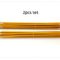 Tent support pole set: two bundles of yellow aluminum rods with end caps
