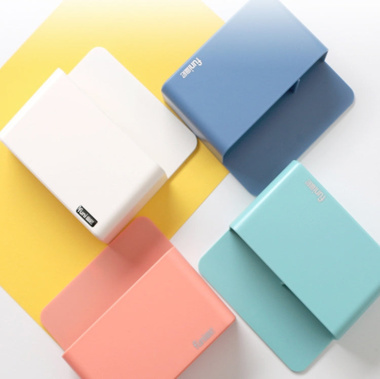 Stack of colorful magnetic pen holders: white, blue, teal, and pink