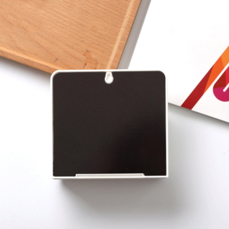 Black magnetic pen holder with hanging loop, close-up