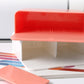 Coral-red magnetic pen holder with open top, storage box for stationery