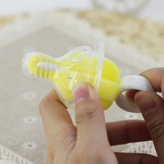 Yellow sponge cleaning brush with white handle ring for baby bottle nipples and pacifiers