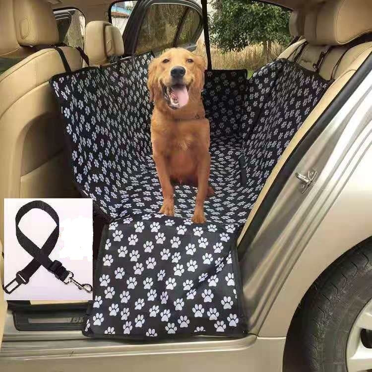 Black dog car seat cover hammock with white paw print and raised front flap