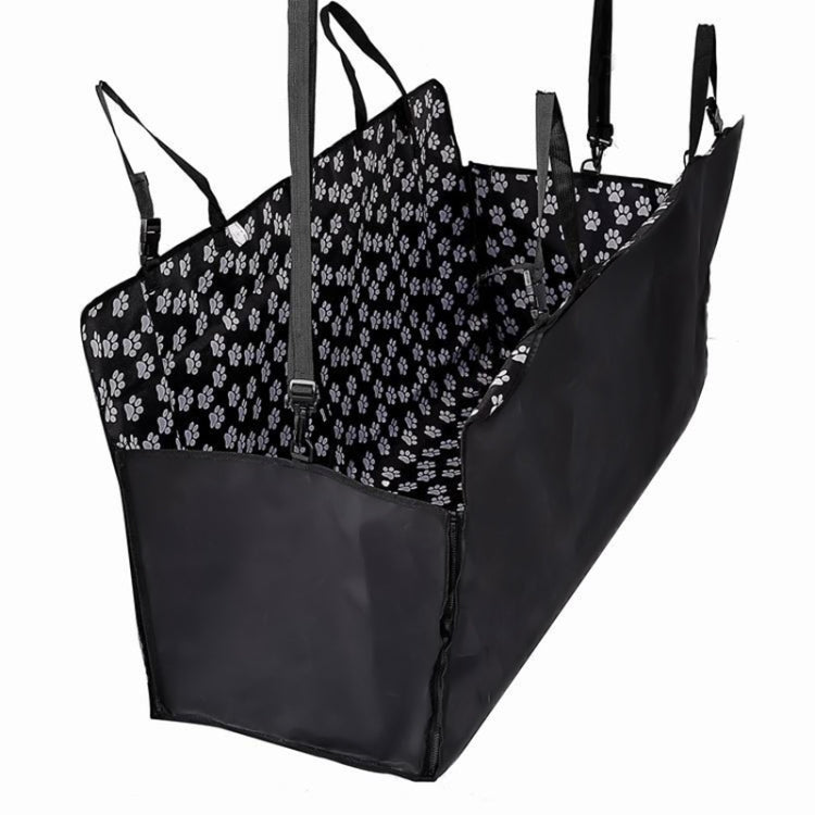 Black pet car seat cover hammock with white paw print, multiple top and side straps