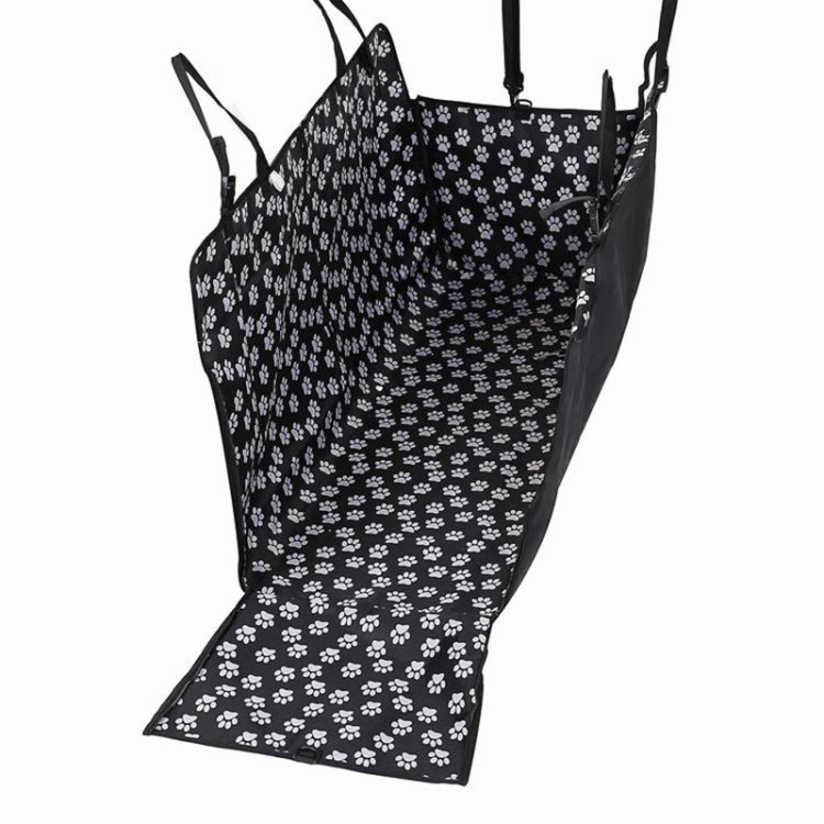 Black pet car seat cover hammock with white paw print, center panel and straps