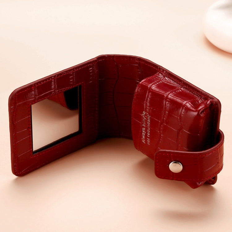 Red wine croc-pattern lipstick bag opened with mirror panel and snap button