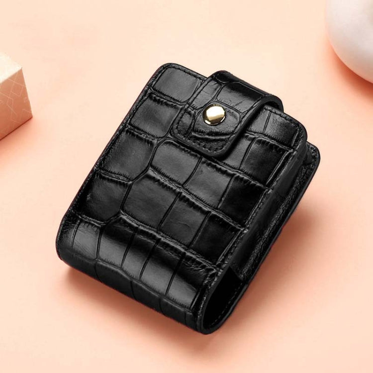 Black croc-pattern lipstick bag with flap and round metal snap closure