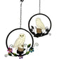Two hanging solar owl garden LED lights with chains, black ring frames, floral accents
