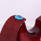 Red leather guitar strap with blue silicone tail stud installed at end