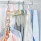 Multiple plastic clothes hangers on a rod, featuring 9-bar drying rack designs