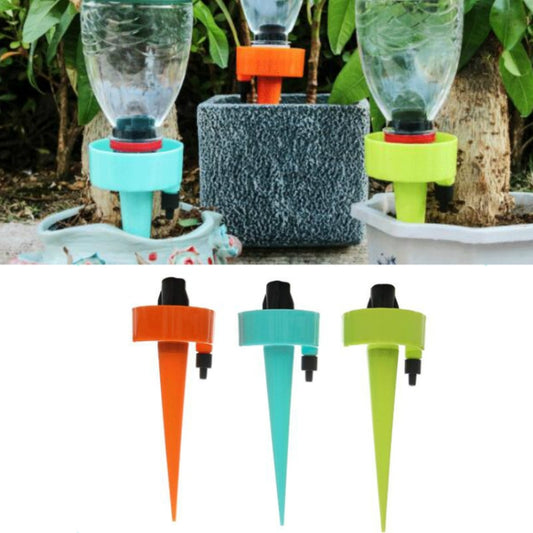 Curved micro-spray irrigation arrows with transparent tubes, orange, blue, and green bases