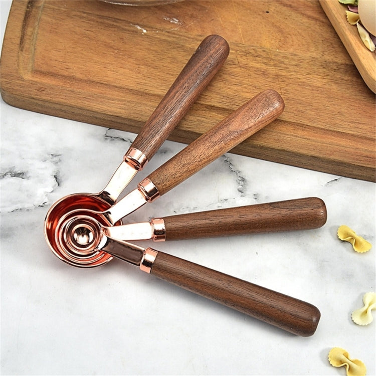 Walnut-handle copper measuring spoons set, four spoon heads with rose-gold finish