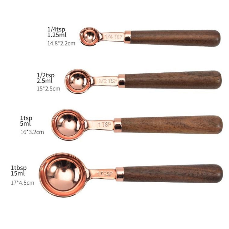 Copper-plated measuring spoons with walnut handles, four size cups displayed