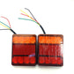 Two LED tail lights with wire leads, red and amber translucent housings