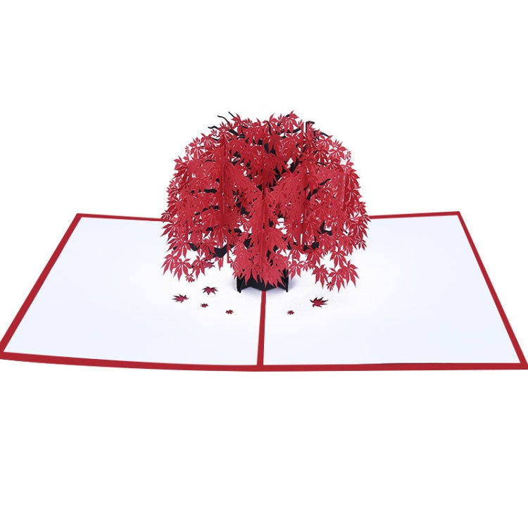 3D maple tree pop-up birthday greeting card with red leaves on an open red-edged card