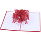 3D maple tree pop-up birthday greeting card opened flat, showing a red leaf canopy