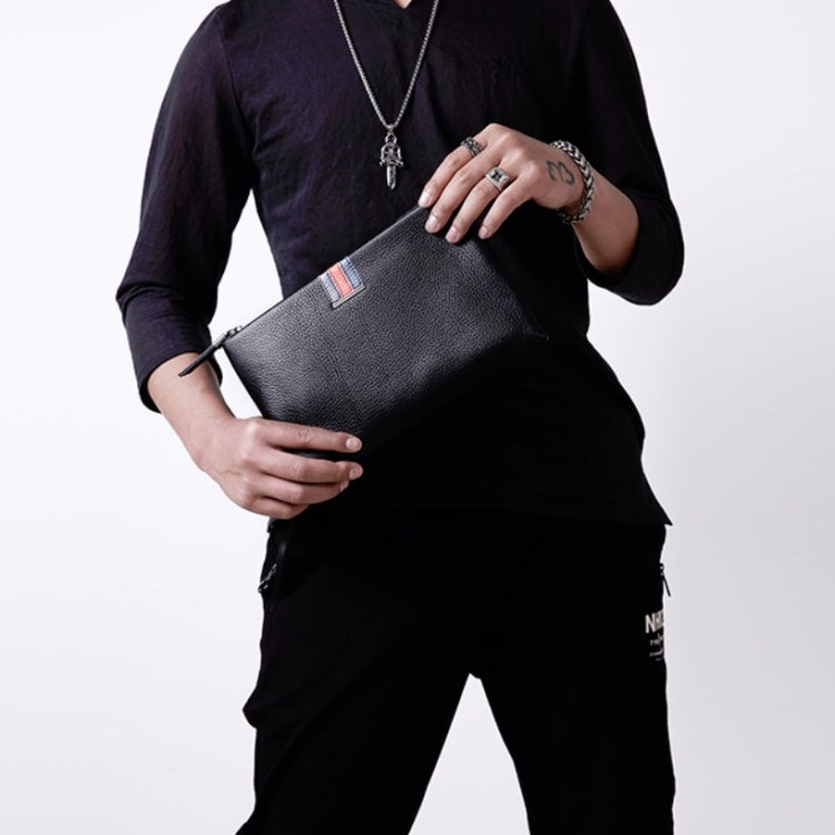 Black leather zip clutch coin purse with wrist strap, worn across body