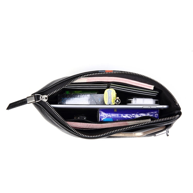 Black leather zip coin purse open with interior cards and small compartments visible.