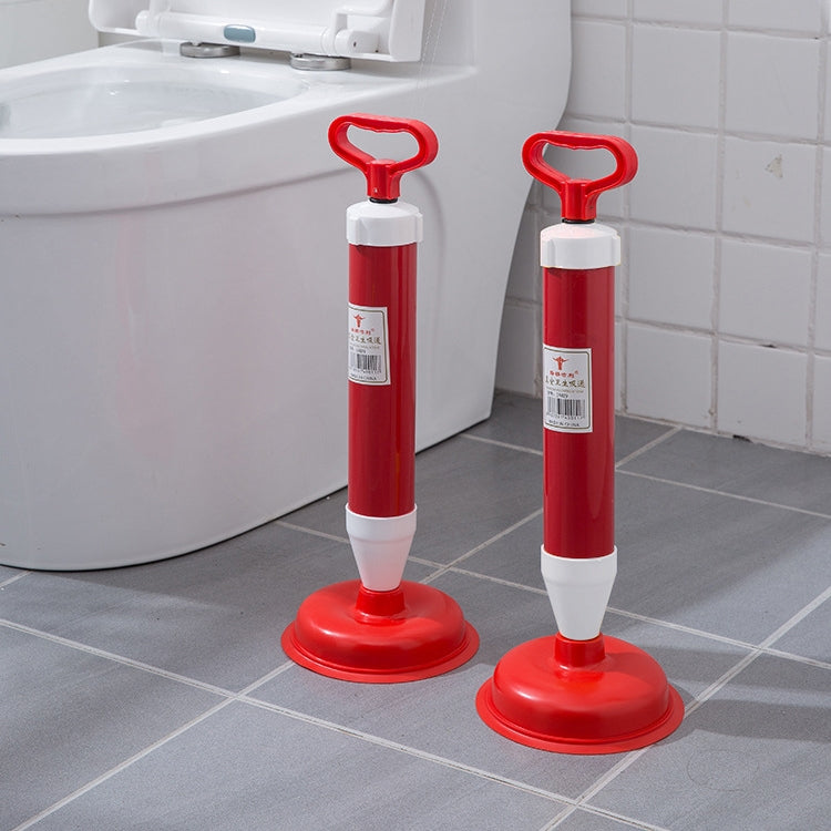 Two red toilet suction cup vacuum pumps with white handles and round suction bases