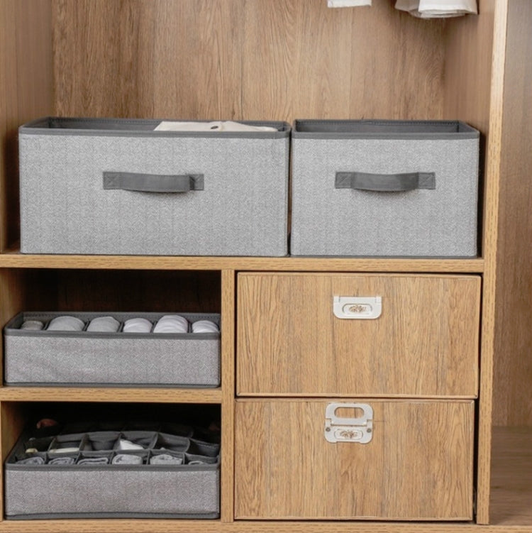 Square non-woven storage boxes, gray fabric with carry handles on shelving
