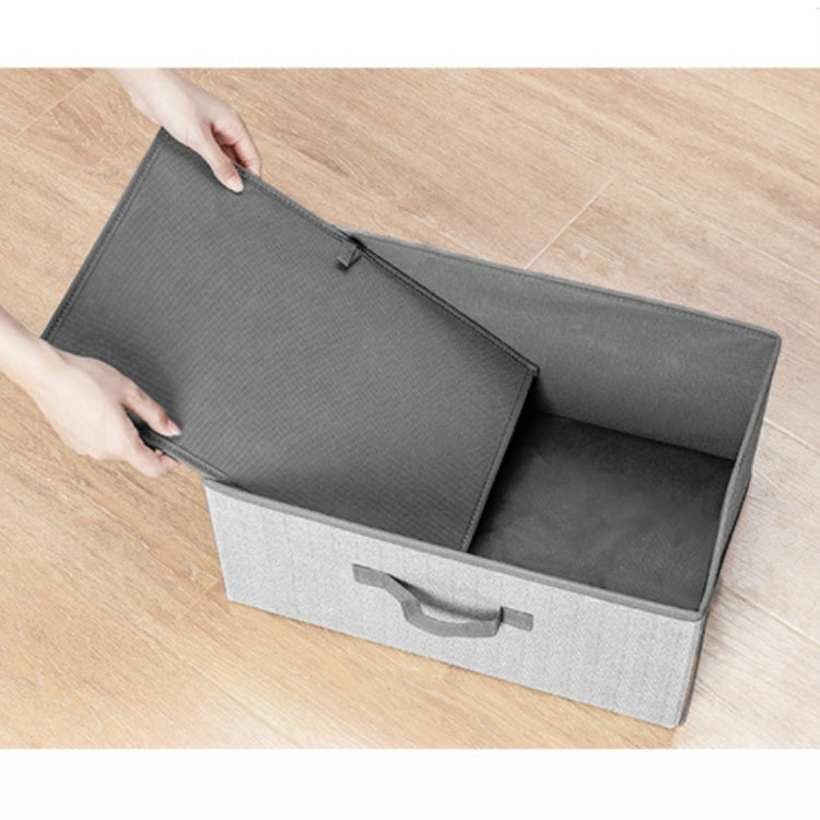 Square non-woven storage box opened with top panels folded back, gray carry handle