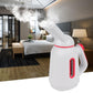 Mini handheld garment steamer in white with red handle accents and steam nozzle