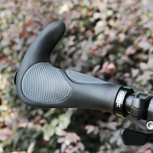 Black rubber bicycle handlebar grips with textured gray anti-slip pads and curved ends
