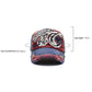 Denim and red baseball cap with two embroidered shark patches on the front