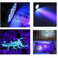 Mini UV flashlight casting purple/blue UV light on multiple surfaces