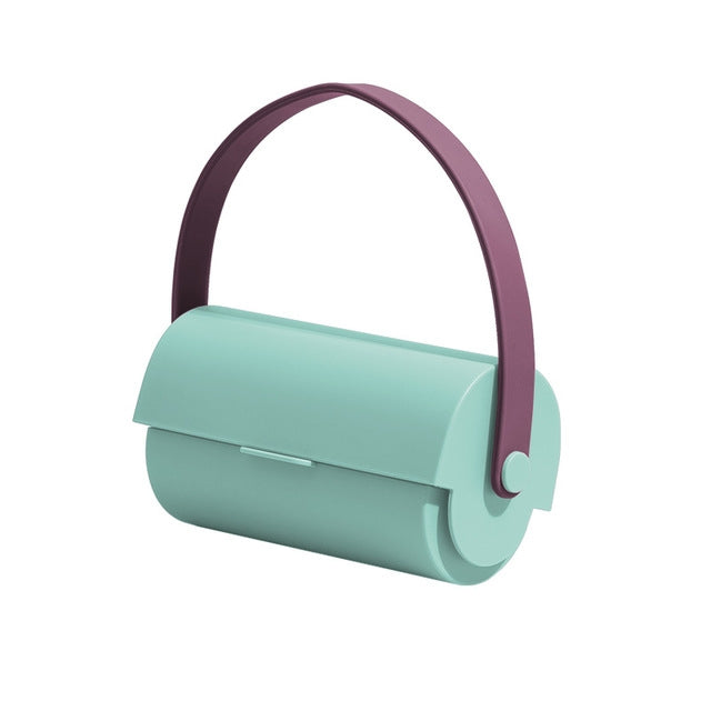 Handheld sticky lint roller, mint base with purple loop handle